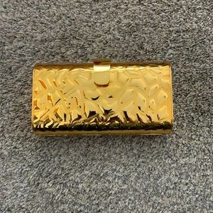 Gold metal clutch
